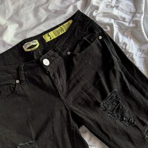 Ripped black low-rise skinnies